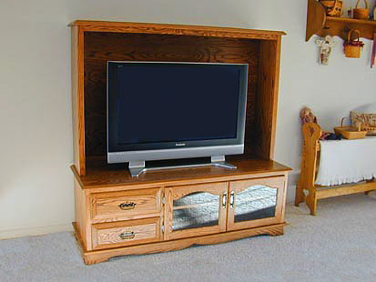 Enclosed plasma screen TV entertainment center with two doors and drawers