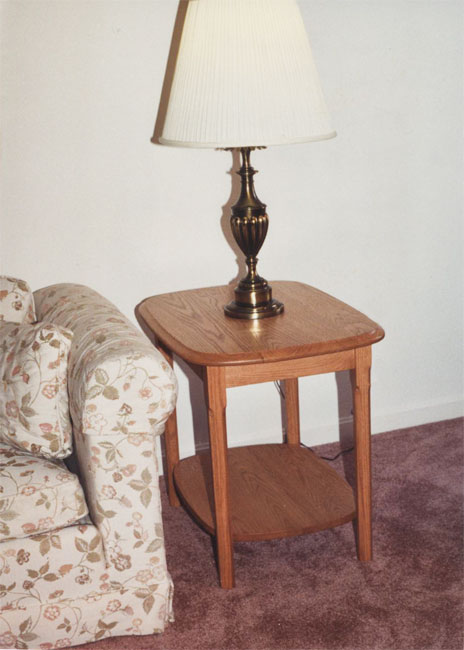 rectangular end table with a shelf in oak wood