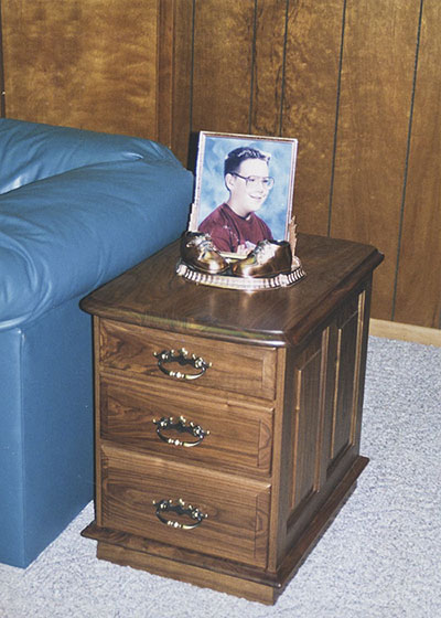 cabinet end table walnut with three drawers