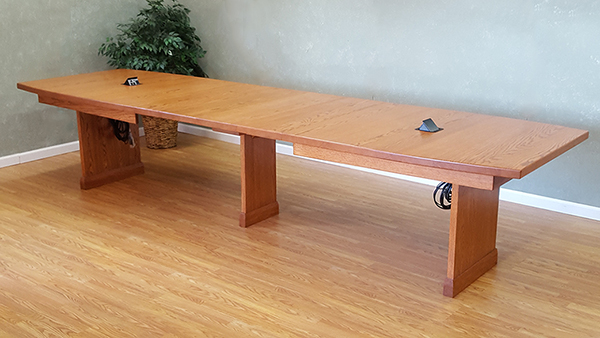 extending conference table flexibility of meeting size.