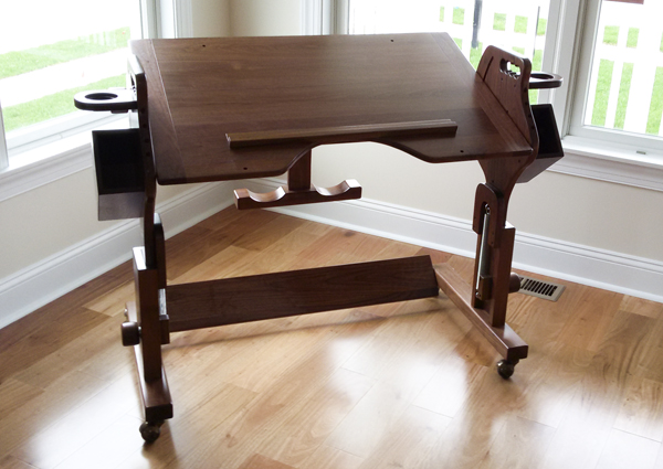 Do it all desk, adjustable height, cup holder, pen holder, foot rests, book holder