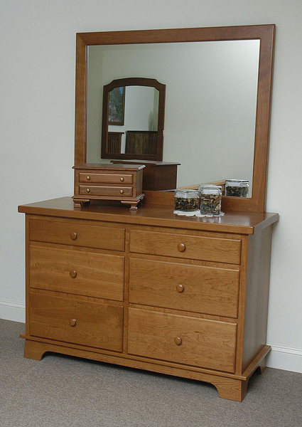 shaker rectangular mirror on 6 drawer dresser constructed with cherry wood.